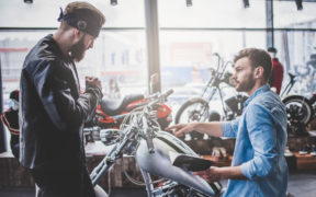 Men in motorcycle shop